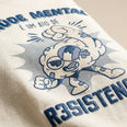 Camiseta Básica Saúde Mental é um Ato Revolucionário Feminina Off-White
