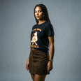 Camiseta Básica Saúde Mental é um Ato Revolucionário Feminina Preto