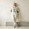 Camiseta Oversized Saúde Mental é um Ato Revolucionário Feminina Off-White