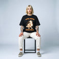 Camiseta Oversized Saúde Mental é um Ato Revolucionário Feminina Preto