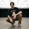 Camiseta Oversized Saúde Mental é um Ato Revolucionário Masculina Preto