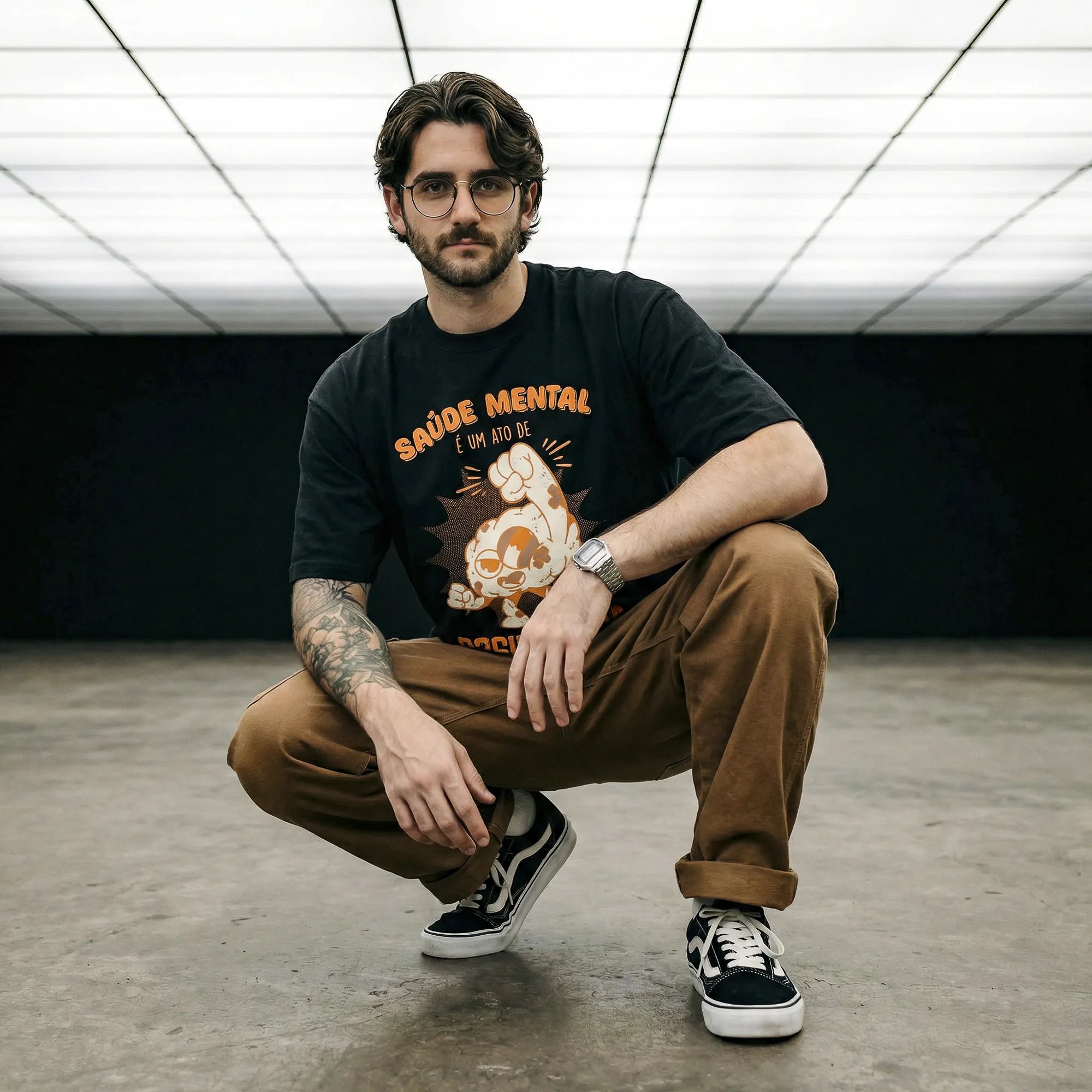 Camiseta Oversized Saúde Mental é um Ato Revolucionário Masculina Preto