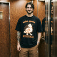 Camiseta Oversized Saúde Mental é um Ato Revolucionário Masculina Preto
