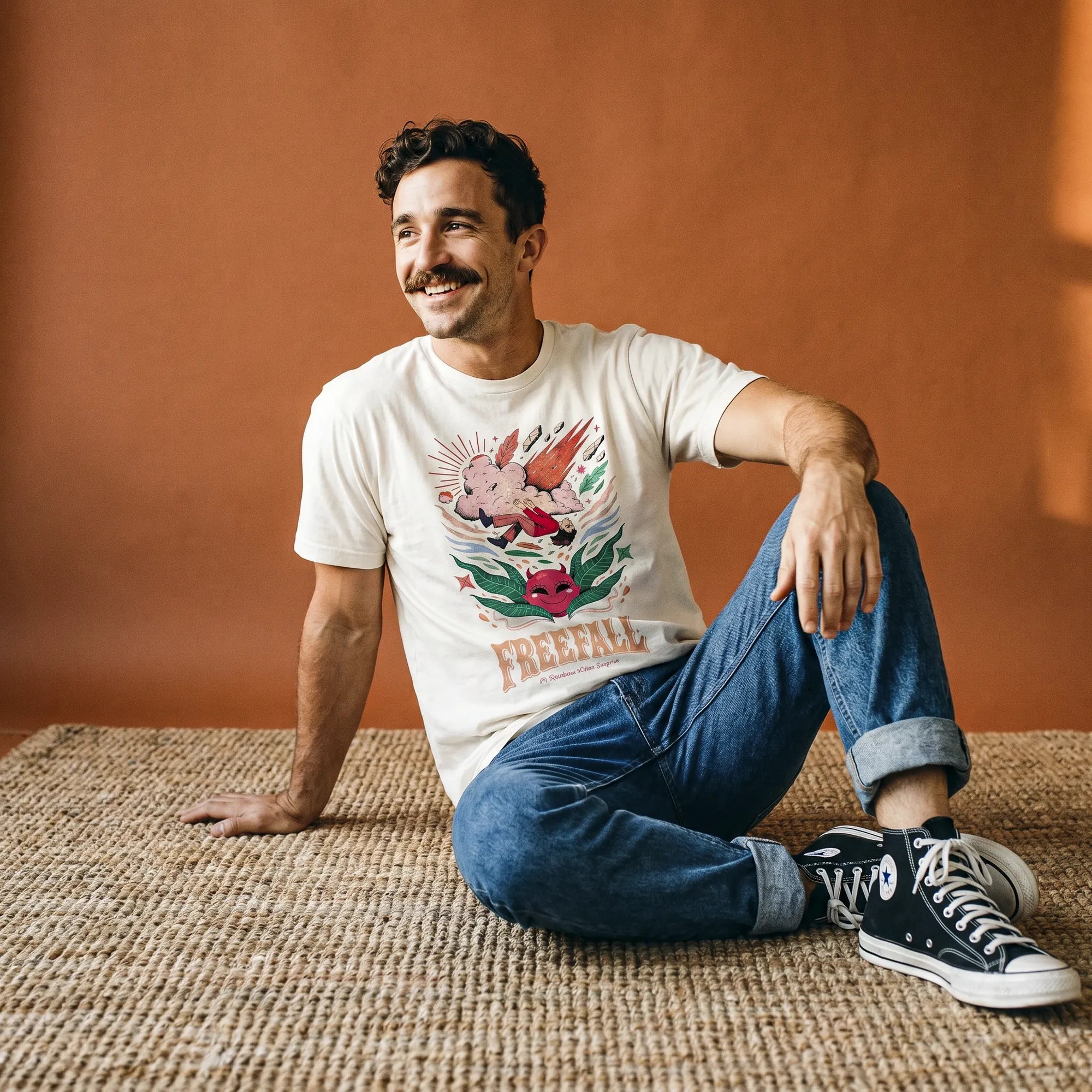 Camiseta Básica It's Called Freefall — Rainbow Kitten Surprise Masculina Off-White