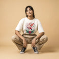 Camiseta Oversized It's Called Freefall — Rainbow Kitten Surprise Feminina Off-White