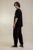 Camiseta Oversized Loucos Abrem Caminhos Masculina Preto