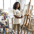 Camiseta Oversized Quem Domina a Percepção, Controla o Resultado Feminina Off-White