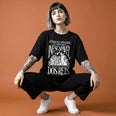 Camiseta Oversized Vivemos no Capitalismo Feminina Preto
