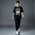 Camiseta Oversized Vivemos no Capitalismo Feminina Preto