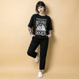 Camiseta Oversized Vivemos no Capitalismo Feminina Preto