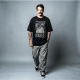 Camiseta Oversized Vivemos no Capitalismo Masculina Preto