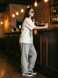 Camiseta Oversized Viver é melhor que sonhar Feminina Off-White