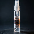 perfuma desamassa spray fundo preto